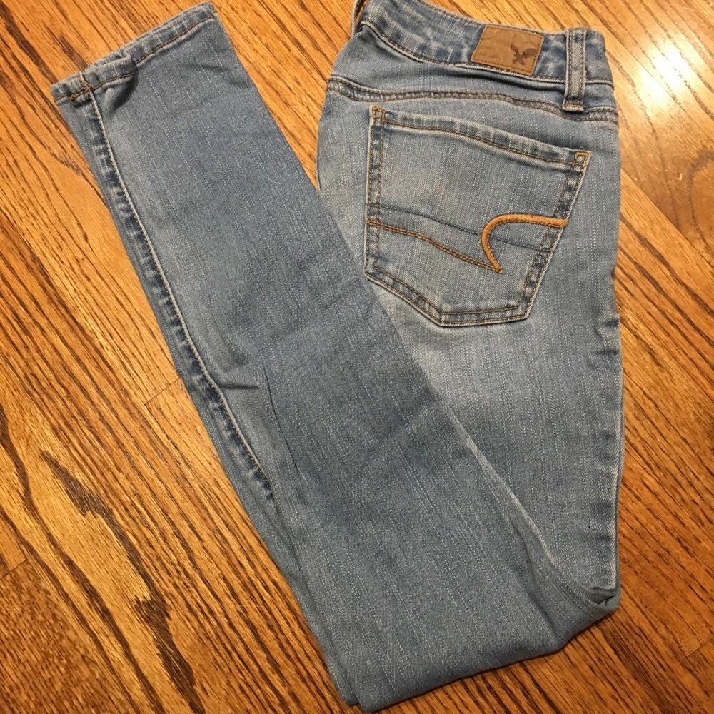 AE light wash stretch begging jeans